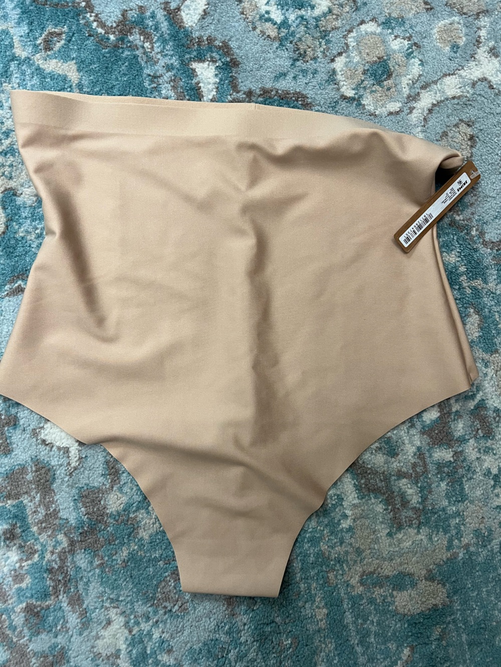 SKIMS Sculpting Seamless Bodysuit in Light Nude